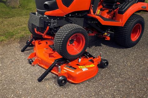 Three different mower decks, grass collectors with Low Dump or High Dump function, front power lift, independent front PTO, professional cab, blades, sweepers, snow blowers,. . Bx2350 mower deck